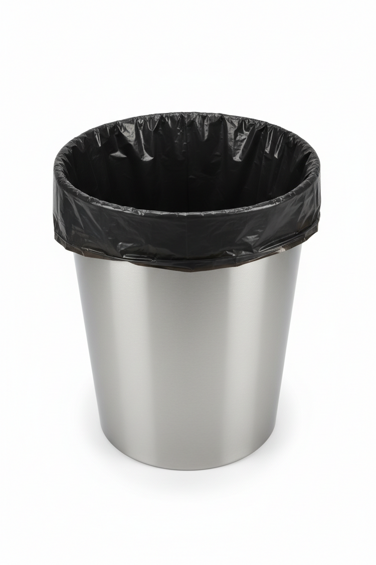 Heavy-duty can liners in a stainless steel trash can, designed for reliable waste containment and protection.